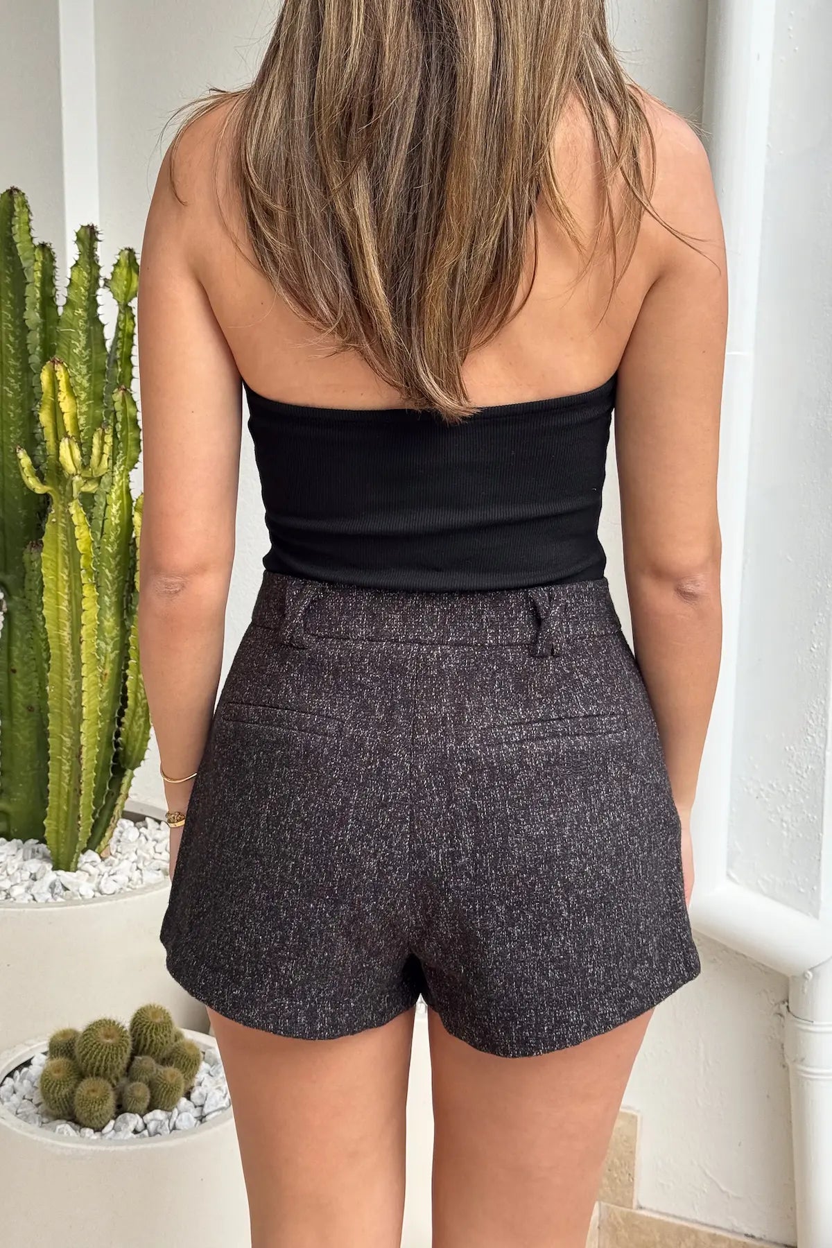 Gretta Short Black Marle by Sneaky Link, tailored mini with subtle A-line, textured poly fabric, perfect with matching blazer for polished layering.