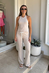 Charlie Pant Sand/White by Sneaky Link, trendy and comfortable low-rise pants with elastic waist and contrast drawcord, perfect for chic summer days and evenings.