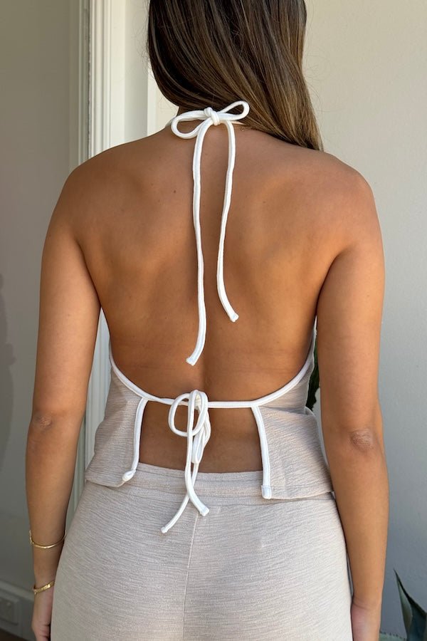 Charlie Halter Top Sand/White by Sneaky Link – A trendy summer essential with a chic halter neckline and open back, perfect for beach-to-bar style.