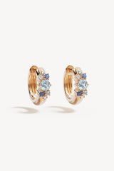 I Breathe, I Become Hoops by By Charlotte – 18k gold vermeil huggie earrings with aquamarine, sapphire and tourmaline stones.