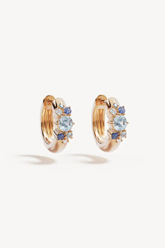 I Breathe, I Become Hoops by By Charlotte – 18k gold vermeil huggie earrings with aquamarine, sapphire and tourmaline stones.