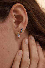 I Breathe, I Become Hoops by By Charlotte – 18k gold vermeil huggie earrings with aquamarine, sapphire and tourmaline stones.