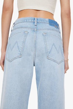 I Could Care Less Jeans by MOTHER – a slouchy low-rise jean with straight leg and faded wash. Perfect for relaxed everyday wear.