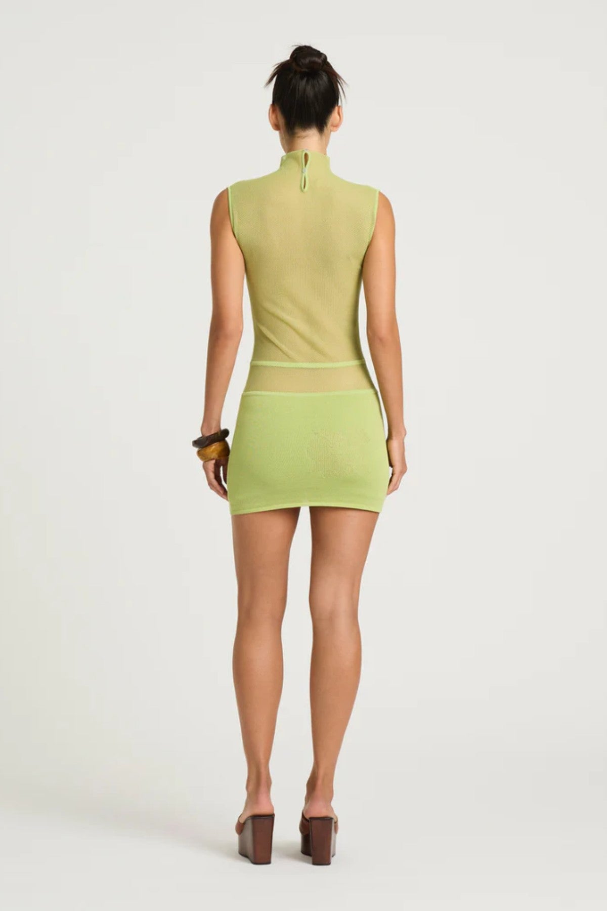 Ida Knit Mini Dress Green by Bec and Bridge, a high-neck knit mini with floral bust detailing and sculpting body-hugging fit.