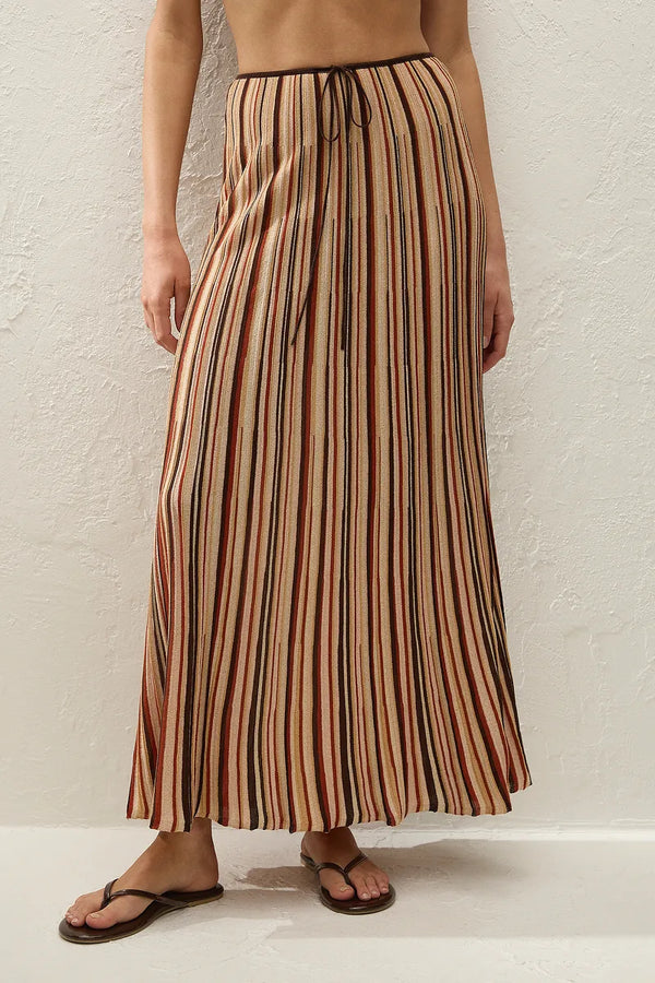 Iden Maxi Skirt in Murano Stripe by Faithfull the Brand, a flared knit midi skirt with drawstring waist and metallic stripe detailing.