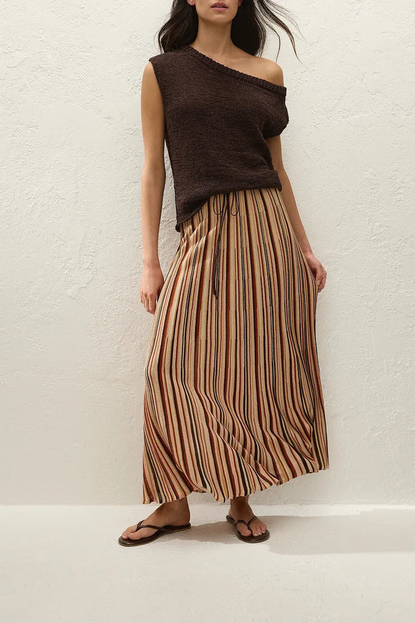 Iden Maxi Skirt in Murano Stripe by Faithfull the Brand, a flared knit midi skirt with drawstring waist and metallic stripe detailing.