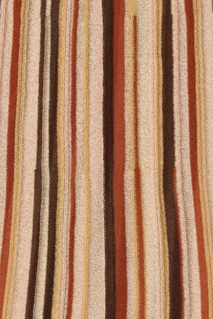 Iden Maxi Skirt in Murano Stripe by Faithfull the Brand, a flared knit midi skirt with drawstring waist and metallic stripe detailing.