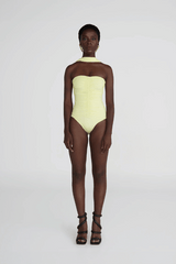 Igara One Piece Soleil by Maygel Coronel, ruched swimsuit with sweetheart neckline and sash detail. Perfect for beach days or elegant swim looks.
