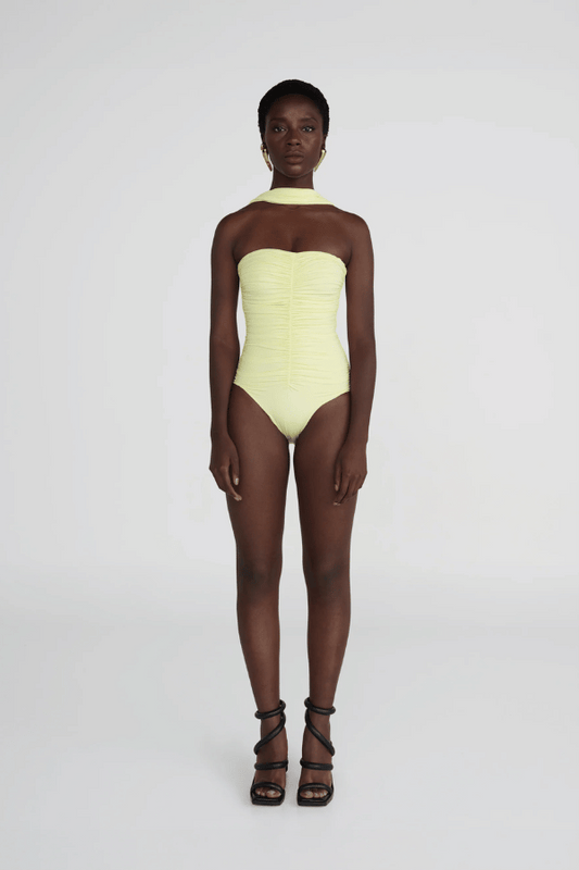 Igara One Piece Soleil by Maygel Coronel, ruched swimsuit with sweetheart neckline and sash detail. Perfect for beach days or elegant swim looks.