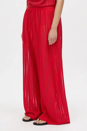 Imara Pant by Camilla and Marc – sheer garnet pants with an elastic waist, hot short lining, and clean topstitching, perfect for bold evening looks.