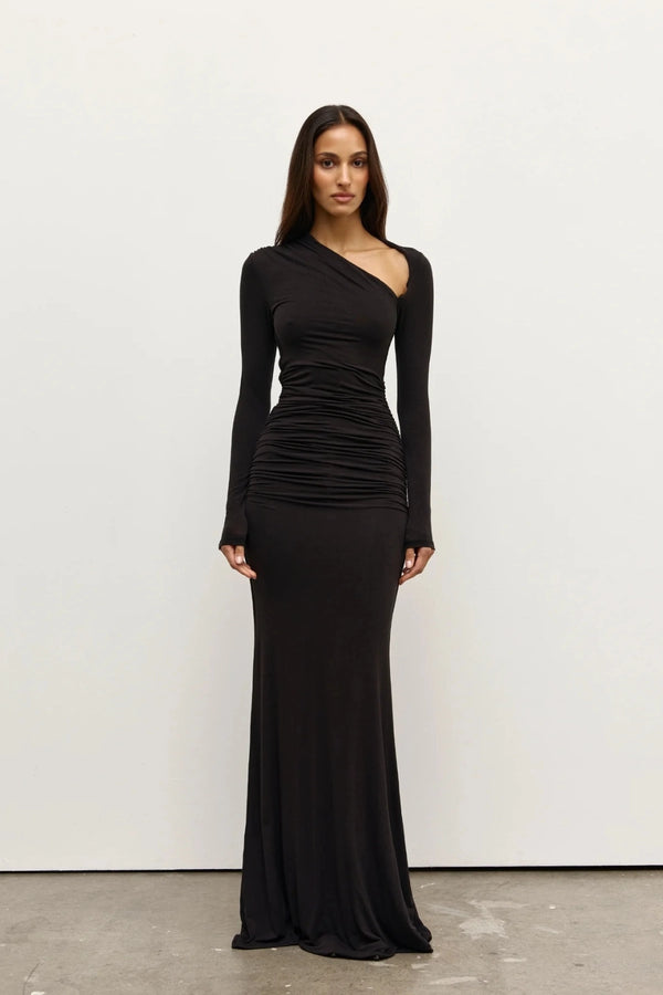 Inaya Maxi Dress Shadow by Bayse – asymmetrical maxi dress with ruched waist and long fitted sleeves.