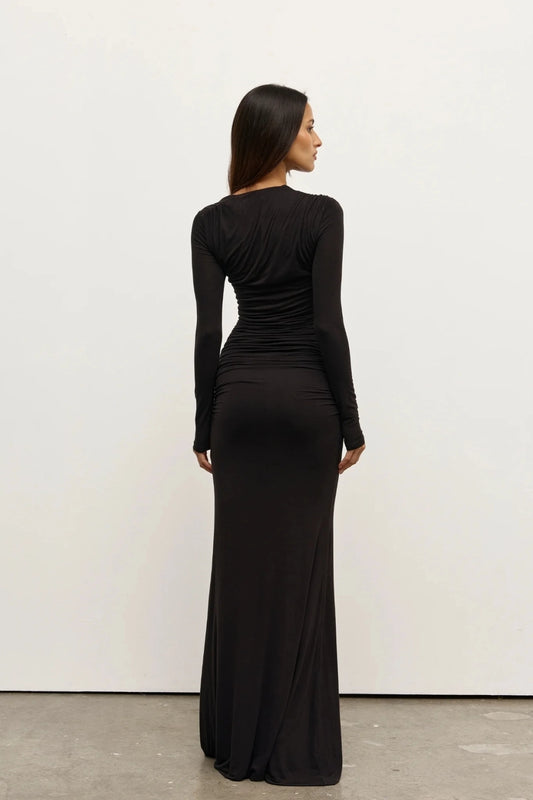 Inaya Maxi Dress Shadow by Bayse – asymmetrical maxi dress with ruched waist and long fitted sleeves.