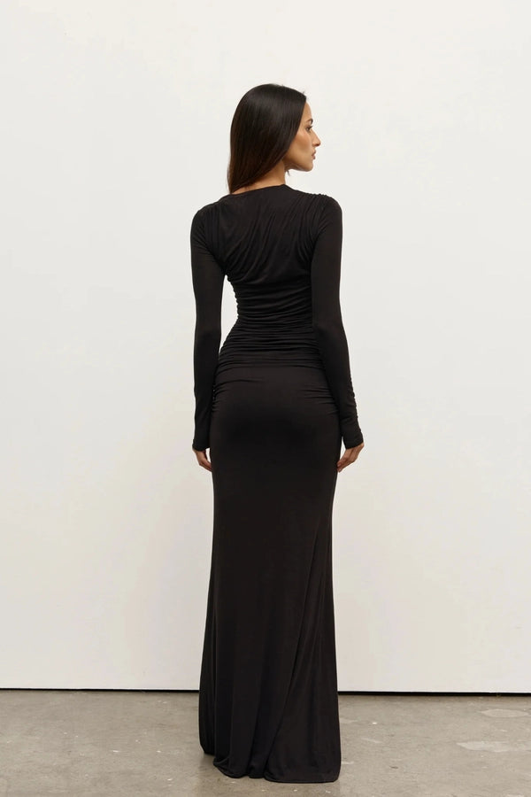 Inaya Maxi Dress Shadow by Bayse – asymmetrical maxi dress with ruched waist and long fitted sleeves.