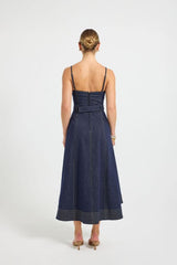 Indie Flared Midi in Indigo Denim by Pasduchas, a stretch denim midi with V-neckline, flared hem, contrast topstitching, and removable belt for tailored finish.
