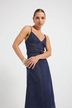 Indie Flared Midi in Indigo Denim by Pasduchas, a stretch denim midi with V-neckline, flared hem, contrast topstitching, and removable belt for tailored finish.

