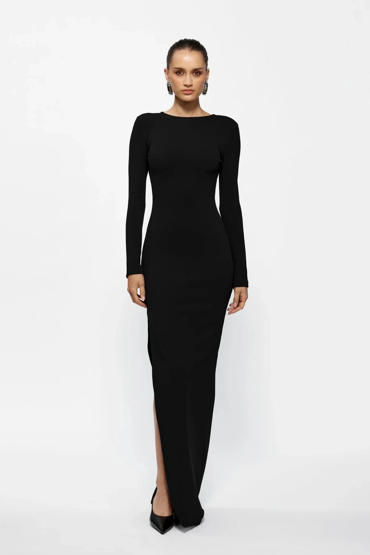 Indie Gown Black by Effie Kats – Long-sleeve stretch crepe gown with dramatic open back, designed to flatter with timeless elegance.