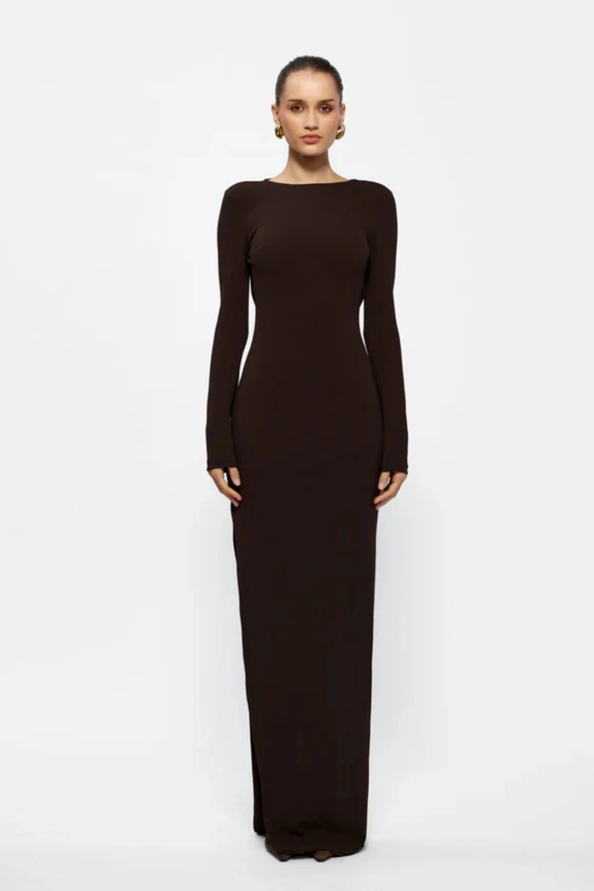 Indie Gown Coffee by Effie Kats – Long-sleeve stretch crepe gown with dramatic open back, designed to flatter with timeless elegance.