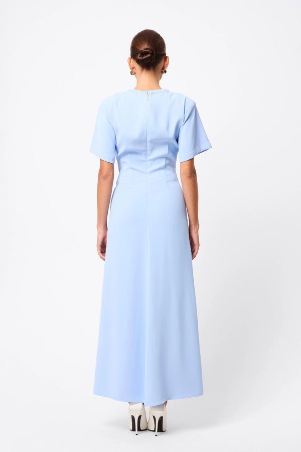Infusion Maxi Dress in Blue by Mossman, a fluid crew-neck maxi with asymmetric ruching and short sleeves for refined yet modern daytime elegance.
