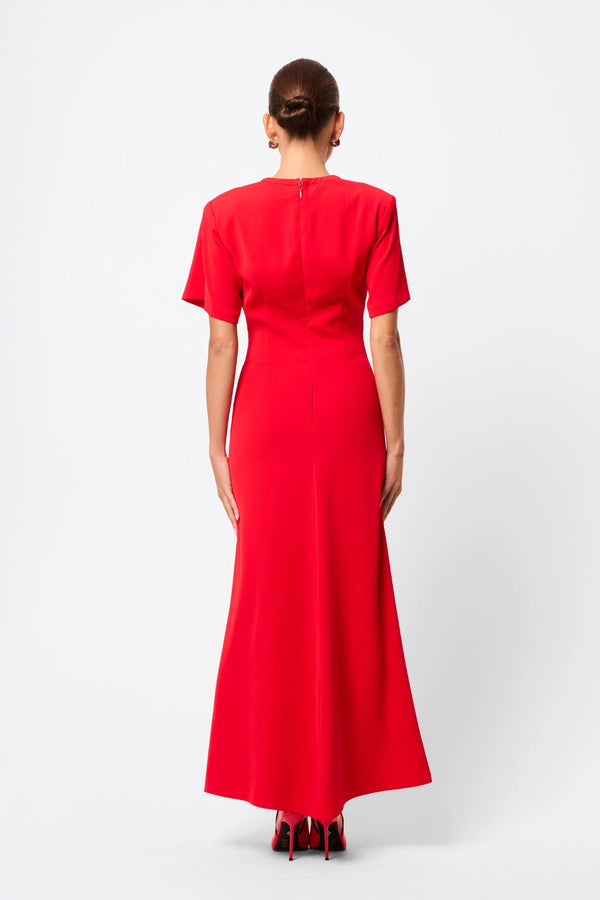 Infusion Maxi Dress in Red by Mossman, a refined crew-neck maxi with asymmetric ruching and fluid drape for effortless day-to-evening elegance.