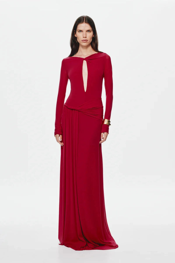 Irina Long Sleeve Dress Cherry by Misha, mesh maxi with twist details and waterfall sash, perfect for elegant evenings or bold events.