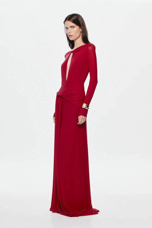 Irina Long Sleeve Dress Cherry by Misha, mesh maxi with twist details and waterfall sash, perfect for elegant evenings or bold events.