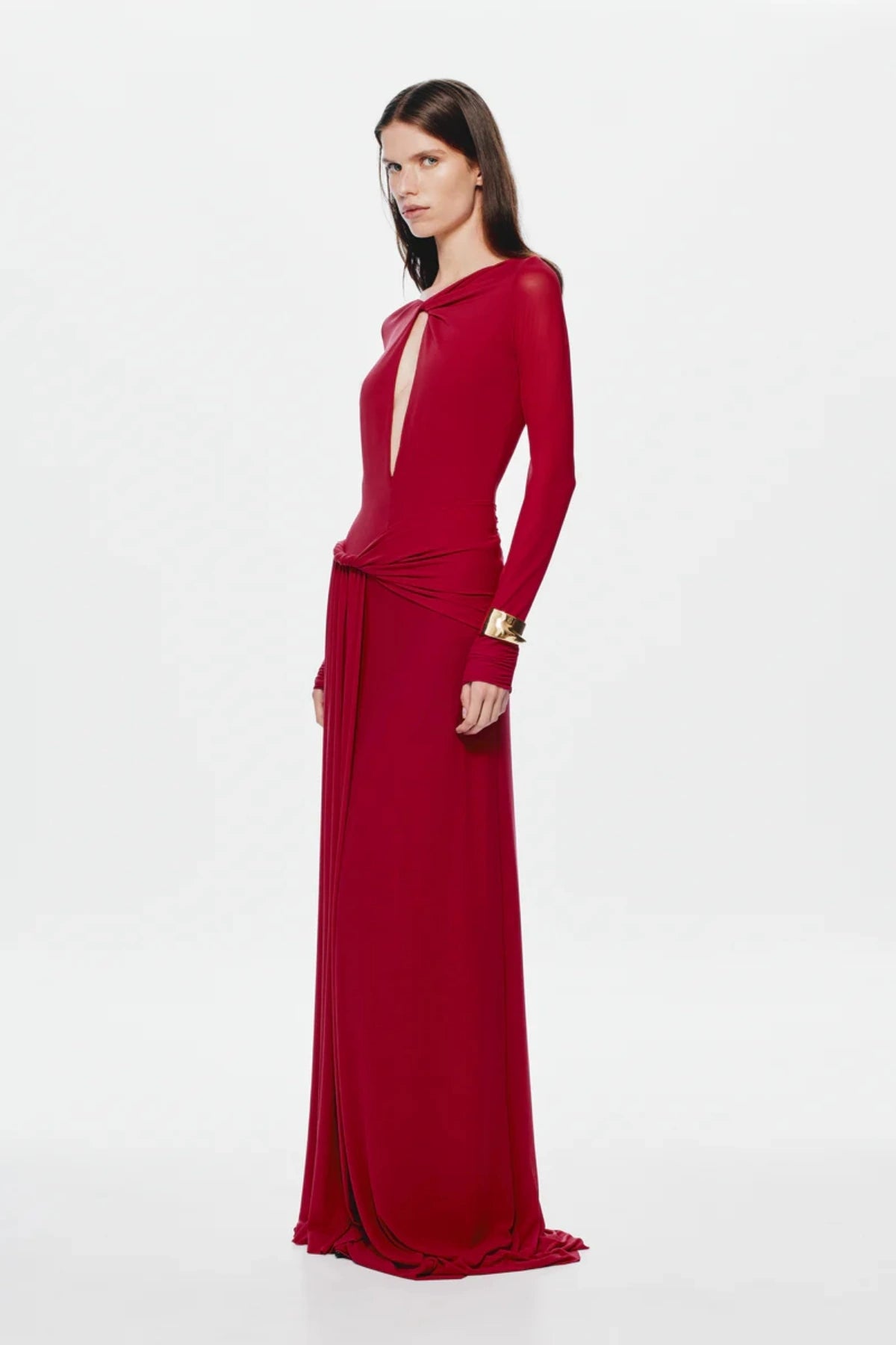 Irina Long Sleeve Dress Cherry by Misha, mesh maxi with twist details and waterfall sash, perfect for elegant evenings or bold events.