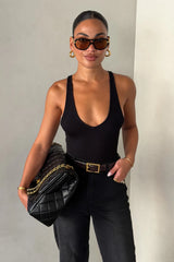 Iris Knit Bodysuit Black by Sneaky Link – a sculpting bodysuit with deep V neckline and stretch fit. Perfect for sleek styling.