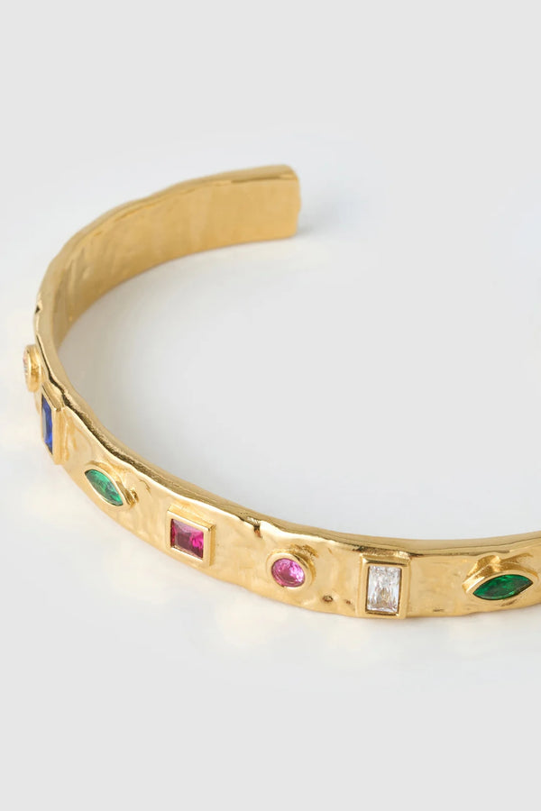 Isabella Gold Cuff by Arms of Eve – textured 14K gold PVD cuff with coloured zircon stone detailing.