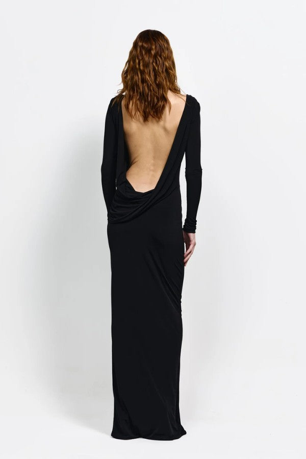Ishani Gown in Black by Effie Kats, elegant stretch jersey gown with high boat neckline, low back, and subtle ruching for a timeless silhouette.