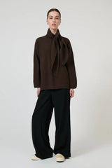 Isla Scarf Sweater Chocolate by Onte – oversized soufflé knit sweater with elegant scarf tie neckline.