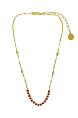 Ivy Necklace by Mountain and Moon — a gold garnet-CZ tennis necklace with vintage bezels and ball-work chain, perfect for bold elegant styling.