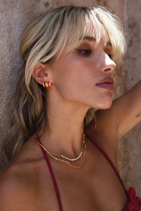 Ivy Necklace by Mountain and Moon — a gold garnet-CZ tennis necklace with vintage bezels and ball-work chain, perfect for bold elegant styling.