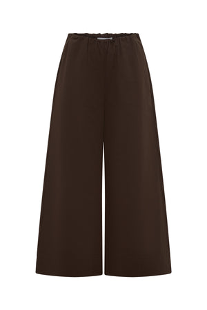 Jaz Mid Rise Relaxed Suit Pant in Chocolate with a mid rise waist and straight leg fit, creating a relaxed, fluid silhouette with a soft, tailored finish.
