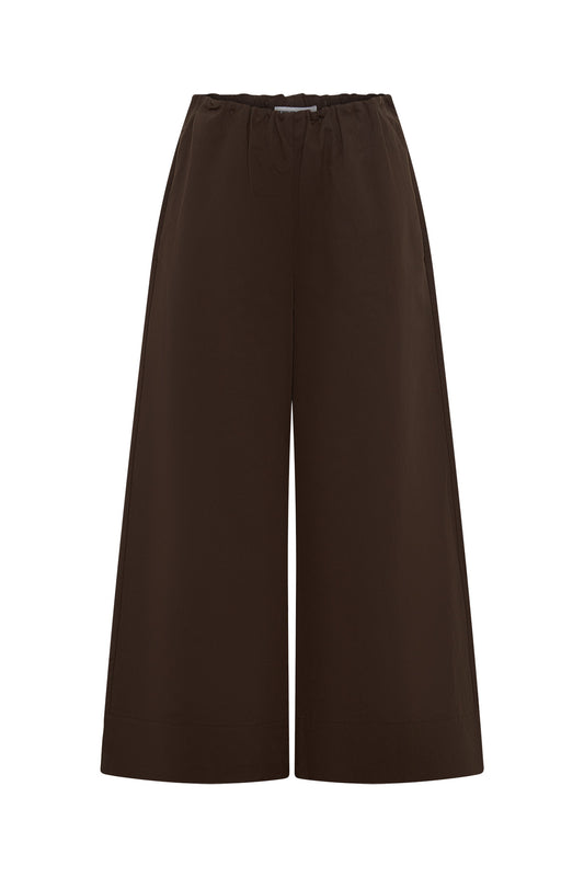 Jaz Mid Rise Relaxed Suit Pant in Chocolate with a mid rise waist and straight leg fit, creating a relaxed, fluid silhouette with a soft, tailored finish.