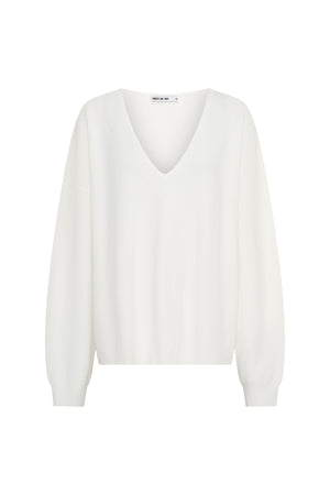 Jaz Oversized V Neck Knit Sweater in White with a deep V neckline and relaxed slouchy fit, creating a soft draped silhouette with a clean, oversized finish.