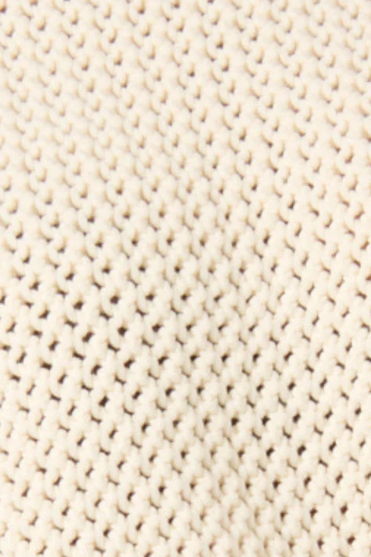 Jana Dress – Ivory by Onte, contrast-knit mini with fringe and rope tie. Perfect for summer days or elevated resort styling.