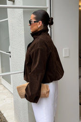 Jaz Faux Suede Funnel Neck Jacket in Chocolate with a high funnel neckline and soft suede finish, creating a structured, relaxed silhouette with a clean, elevated feel.