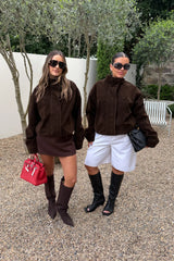 Jaz Faux Suede Funnel Neck Jacket in Chocolate with a high funnel neckline and soft suede finish, creating a structured, relaxed silhouette with a clean, elevated feel.