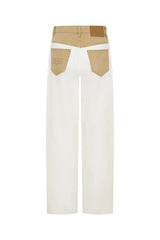 Jaz Hand Baggy Jean White/Beige by Sneaky Link, a crisp white denim jean with contrast beige waist and pocket detail. Perfect for off-duty styling.
