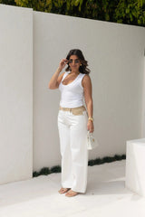 Jaz Hand Baggy Jean White/Beige by Sneaky Link, a crisp white denim jean with contrast beige waist and pocket detail. Perfect for off-duty styling.
