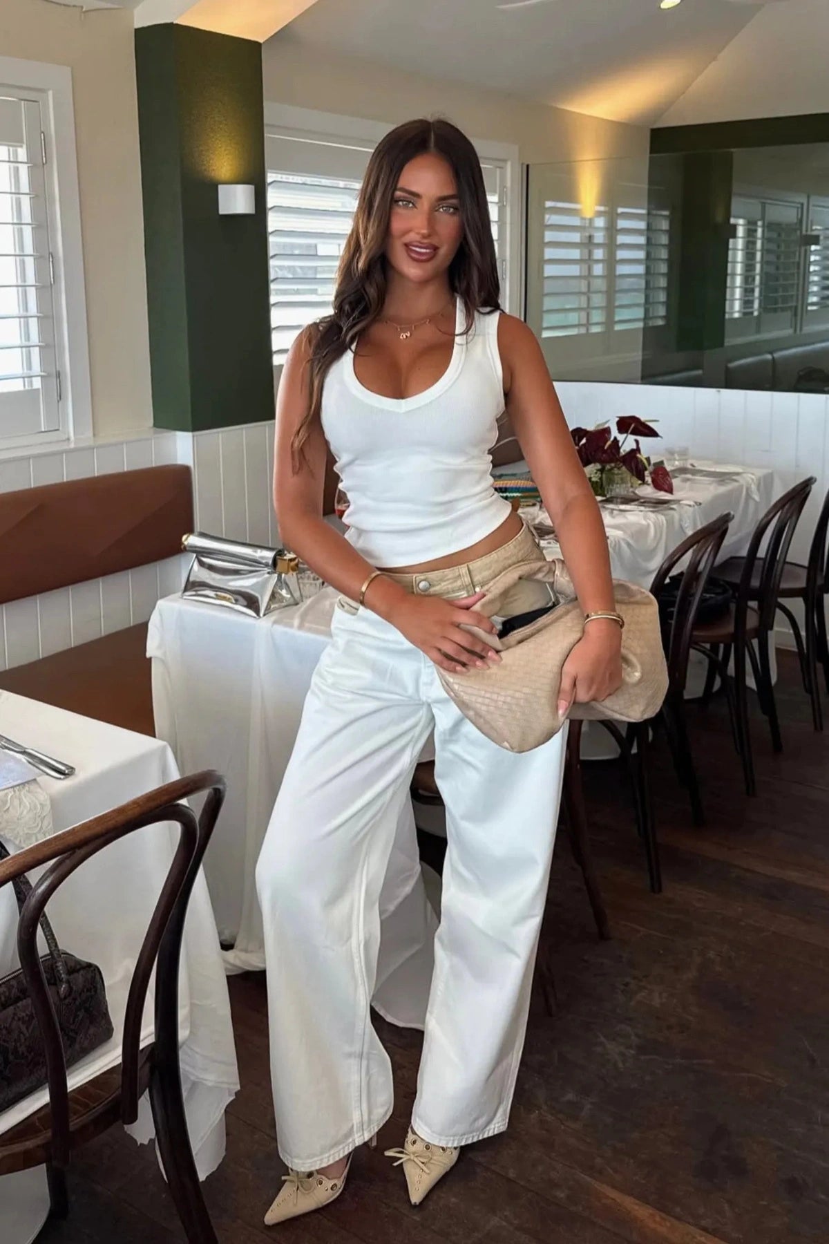 Jaz Hand Baggy Jean White/Beige by Sneaky Link, a crisp white denim jean with contrast beige waist and pocket detail. Perfect for off-duty styling.
