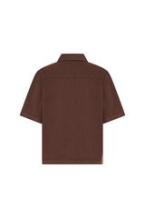 Jaz Hand Denim Shirt Chocolate by Sneaky Link – a button-up denim shirt with collar and short sleeves. Perfect for elevated styling.