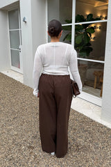 Jaz Mid Rise Relaxed Suit Pant in Chocolate with a mid rise waist and straight leg fit, creating a relaxed, fluid silhouette with a soft, tailored finish.