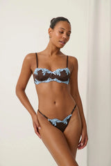 Jean Thong Espresso by Kat the Label – satin thong with blue lace trim and adjustable waistband.