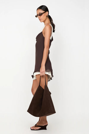 Jehnaya Asym Mini Dress by Bec + Bridge, an asymmetric dual-tone mini with cowl neckline, knotted shoulder, and mesh contrast for modern allure.