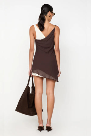 Jehnaya Asym Mini Dress by Bec + Bridge, an asymmetric dual-tone mini with cowl neckline, knotted shoulder, and mesh contrast for modern allure.