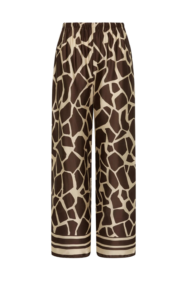 Jensen Pant in Ombra by Faithfull the Brand, a mid-rise satin pant with elasticated waist, wide straight leg, and animal print finish.