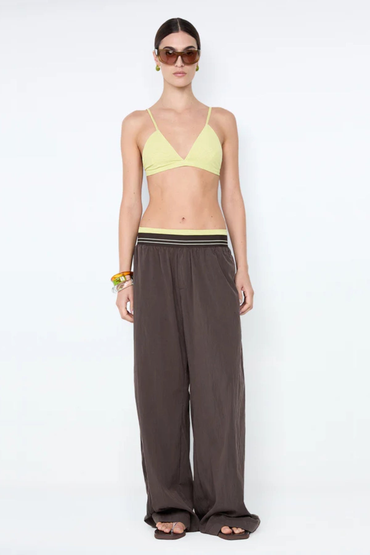 Jerri Wide Leg Pant by Bec + Bridge, a lightweight nylon pant with elastic waistband and wide-leg silhouette for effortless, relaxed sophistication.
