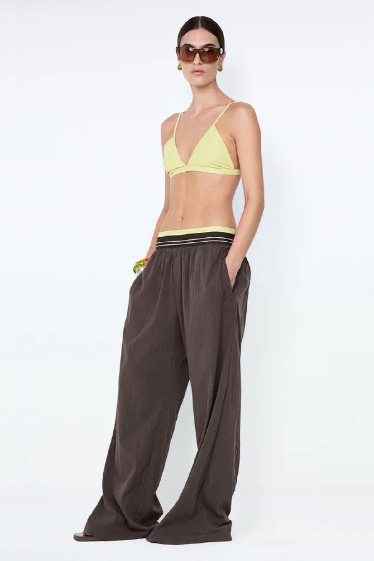 Jerri Wide Leg Pant by Bec + Bridge, a lightweight nylon pant with elastic waistband and wide-leg silhouette for effortless, relaxed sophistication.