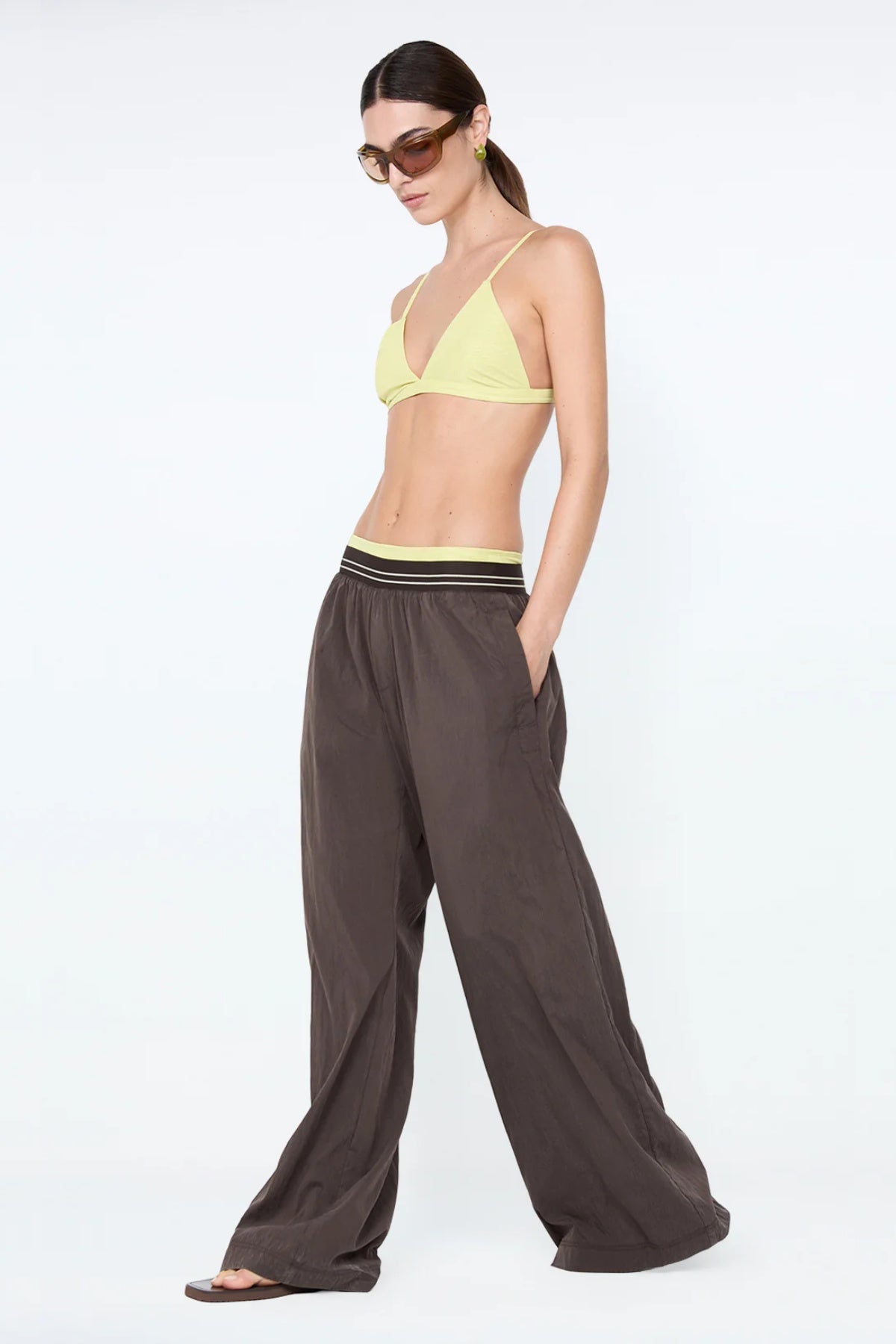 Jerri Wide Leg Pant by Bec + Bridge, a lightweight nylon pant with elastic waistband and wide-leg silhouette for effortless, relaxed sophistication.